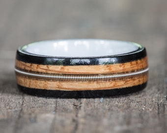 Tennessee Whiskey Barrel, Ebony, and White Ceramic Ring with Guitar String Inlay