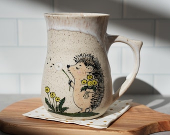 Handmade Ceramic Hedgehog And Dandelions Mug: Speckled Stoneware, Cream Glaze, Farmhouse Charm
