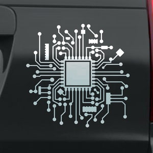 May include: A white sticker of a circuit board with a central processor chip on a black car. The sticker is a stylized design of a computer chip with lines and dots representing the circuitry. The text "BlazingVault.com" is visible at the bottom of the image.
