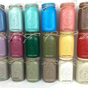 May include: A collection of 18 mason jars painted in various colors, including Wedgewood, Duckling Egg, French Provence, Retro Blue, Coral Pink, Earthen Brown, Lilac Lavender, Red Onion, Hunter Green, Olive Green, Vintage Yellow, Vintage Red, French Linen, Antiqued French Linen, Chateau Green, Coco Powder, Vintage White, and Country Beige.