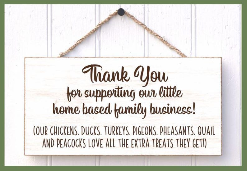 May include: A rectangular wooden sign with the text "Thank You" in a decorative font, expressing gratitude for supporting a home-based family business. The sign also mentions chickens, ducks, turkeys, pigeons, pheasants, quail, and peacocks.