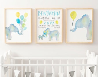 May include: Three framed watercolor prints featuring blue and yellow elephants. The center print includes the name Benjamin Thomas Foster, the date Monday October 12, 2017, the time 6:43 in the evening, 52 centimeters, and 4325 grams.