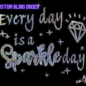 May include: A sparkly rhinestone design that reads "Every day is a sparkle day" with a diamond shape and stars. The design is on a black background and includes the text "Custom Bling Order" and "by @blingdots".