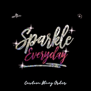 May include: A graphic design on a black background featuring the text Sparkle Everyday rendered in shimmering, multi-colored rhinestones. The word Sparkle is in silver, while Everyday is in a pink-to-purple gradient. Small starburst accents surround the text.