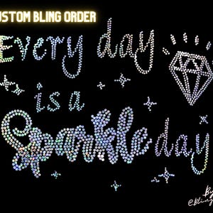 May include: A custom bling order for a t-shirt with the text "Every day is a Sparkle day" in iridescent rhinestones. The design also includes a diamond and stars.