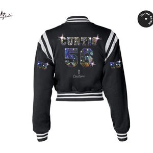 May include: Black varsity jacket with white stripes on the sleeves. The back features the name "CURTIS" and the number "56" in a sparkling, colorful design. The jacket has a custom arrow and the text "Custom" below the number.