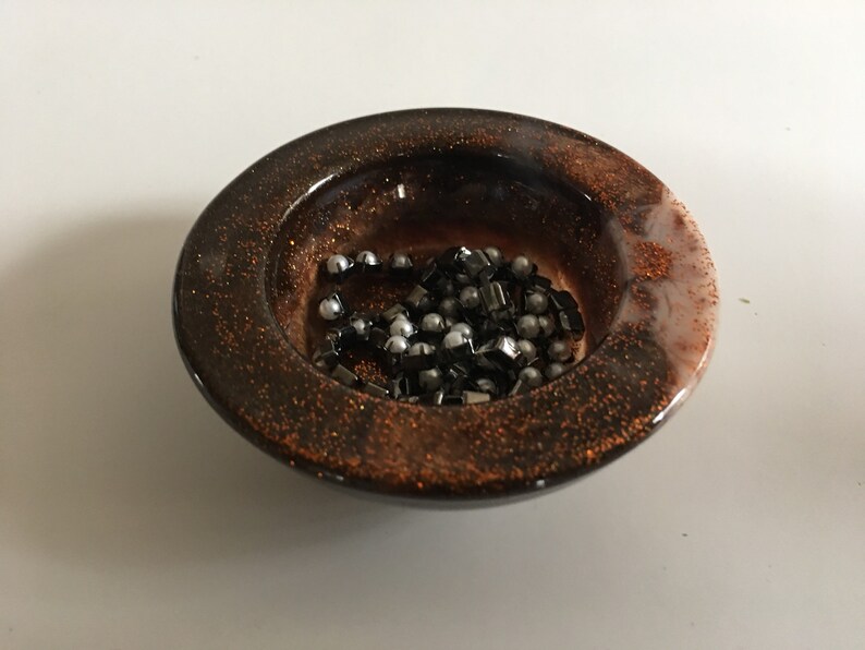 Small brown and cream ring or votive dish with burnt orange glitter and gold shimmer