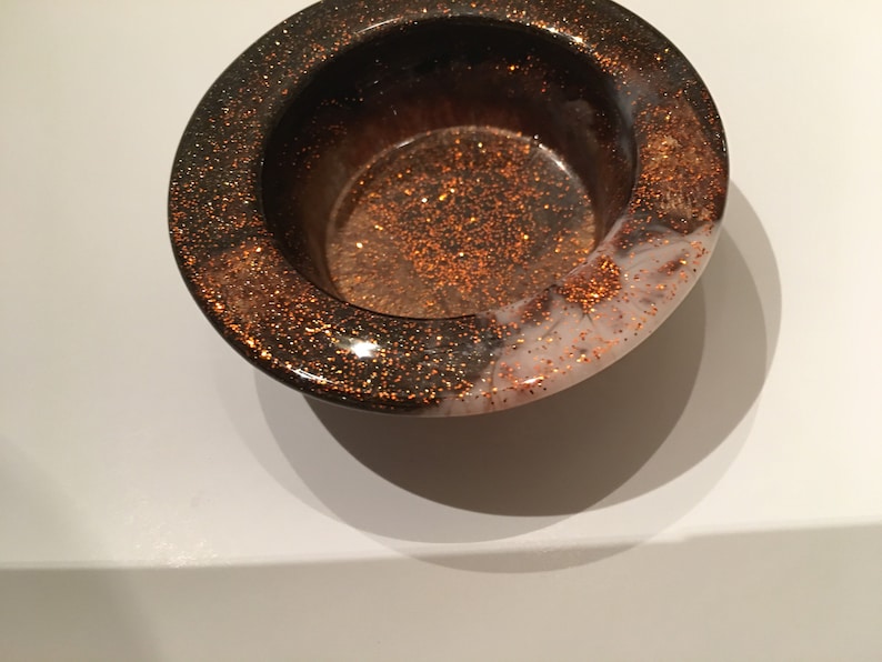 Small brown and cream ring or votive dish with burnt orange glitter and gold shimmer