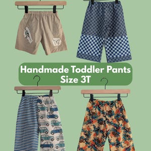 May include: Four pairs of handmade toddler trousers in size 3T. Top left: beige shorts with butterfly patches. Top right: blue and white checkered trousers. Bottom left: blue striped and car-print trousers. Bottom right: yellow trousers with a bird and floral print.