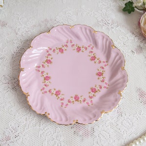 Pink porcelain dessert plate with pink and white flowers and 24 k gold decoration