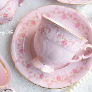 Pink porcelain coffee set with floral and gold decorations image 9