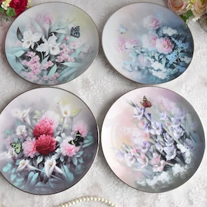 Vintage porcelain floral hanging plate set