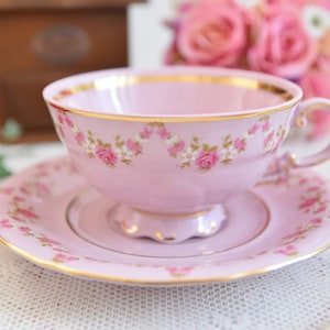 Vintage teacup and saucer pink porcelain by VV