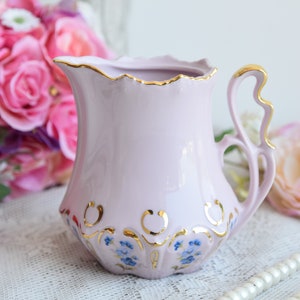 Pink Porcelain milk jug creamer with Blue Floral Accents and Gold Trim