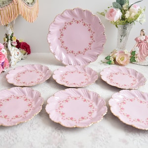 Pink porcelain dessert plates and cake plate set with floral decoration and 24k gold details from LL