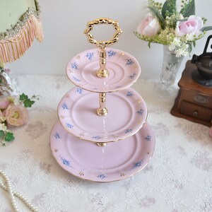 Pink porcelain cake stander with floral decorations by LL image 2