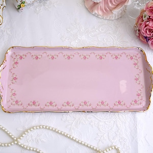 Vintage pink porcelain decorative tray with floral and 24 karat gold decorations