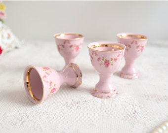 Pink porcelain set of 4 egg cup holder set with golden and flowers decorations from LL