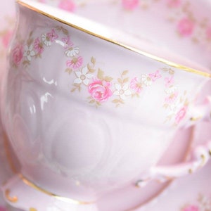 Pink porcelain coffee set with floral and gold decorations image 10