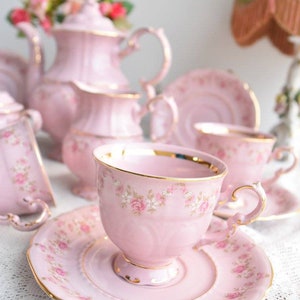 Pink porcelain coffee set with floral and gold decorations image 8