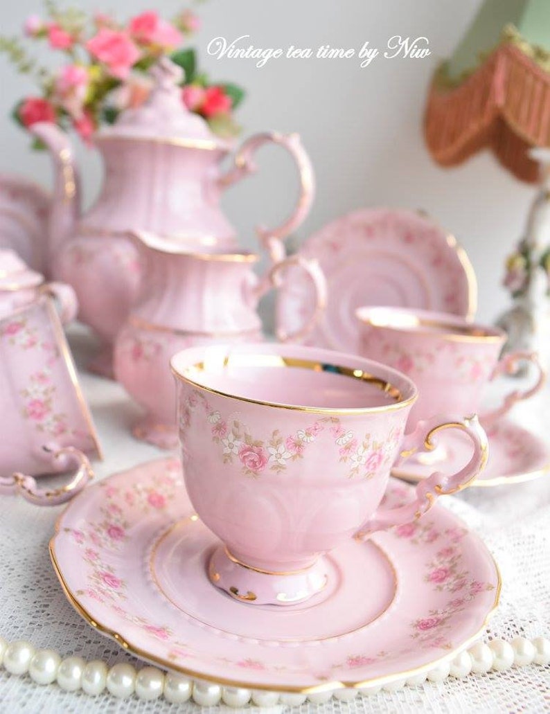 Pink porcelain coffee set with floral and gold decorations image 8
