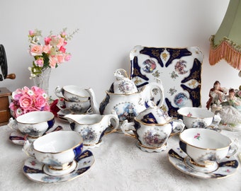 Antique Tea Set by JL, Cobalt Blue Porcelain with Rococo Courting Scenes, Gold Trim, Full Service