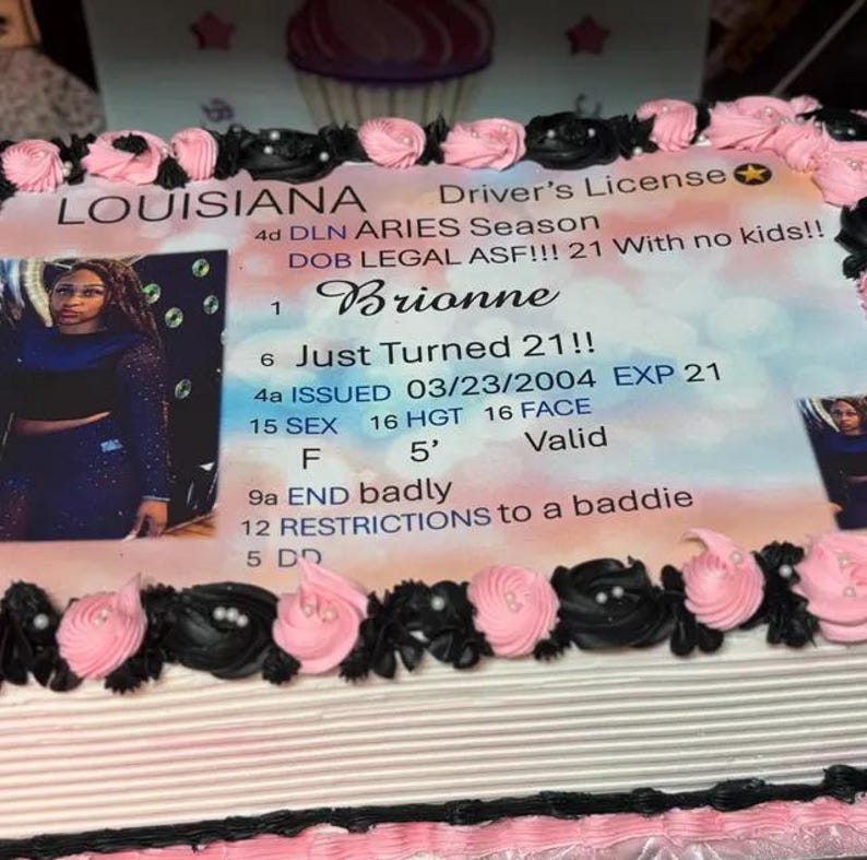 May include: A rectangular sheet cake decorated with pink and black frosting swirls. The top features an edible print of a Louisiana driver's license for Brionne, noting she just turned 21, with a photo of a person and various text details.