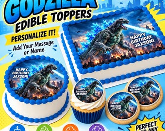 May include: Edible cake, cupcake, and cookie toppers featuring a graphic of Godzilla breathing blue fire over a city skyline. The text reads GODZILLA EDIBLE TOPPERS, PERSONALIZE IT! Add Your Message or Name, HAPPY BIRTHDAY JAXSON!, CAKES, CUPCAKES, COOKIES & MORE!, and PERFECT FOR ANY PARTY!