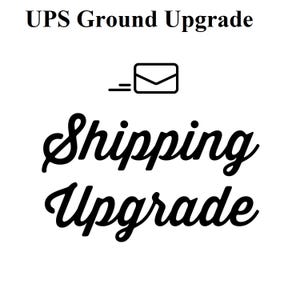 May include: Black and white graphic of an envelope with a dashed line and the text "UPS Ground Upgrade" and "Shipping Upgrade" in a cursive font.