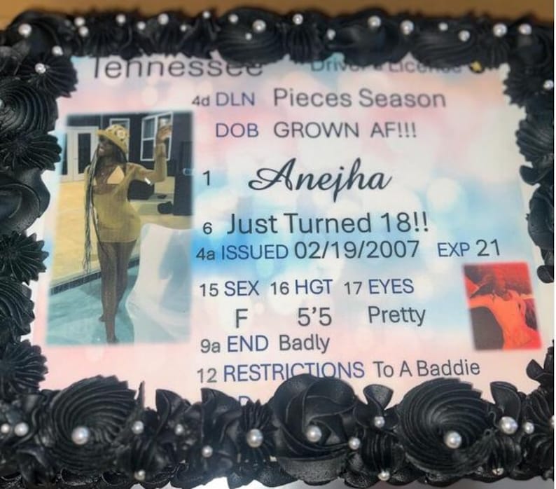 May include: A rectangular cake with black frosting borders and white pearl accents. The top features an edible print of a Tennessee driver's license with the name Anejha, birth date 02/19/2007, and text including Just Turned 18, Grown AF, and To A Baddie.