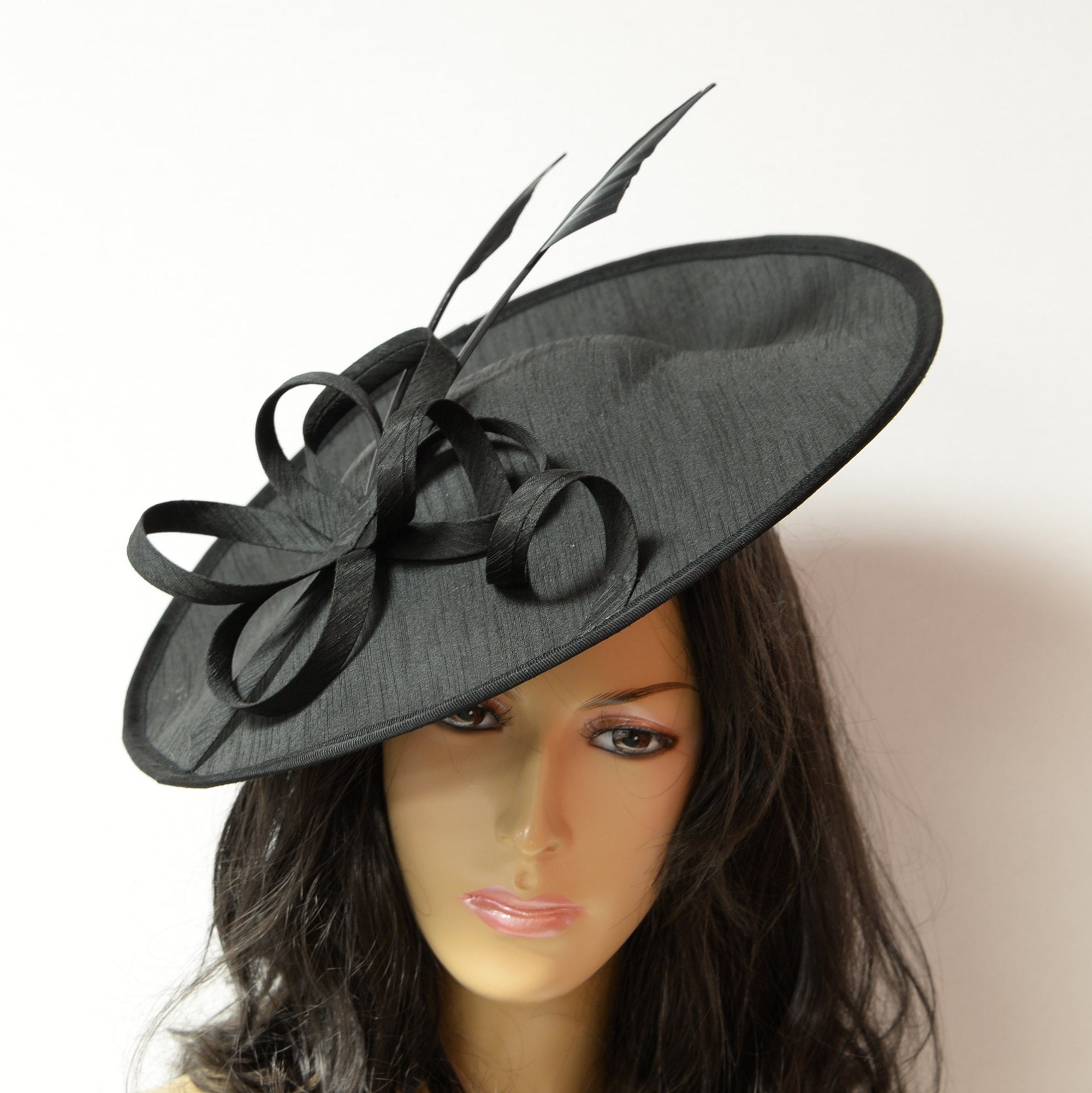 Black Fascinator on a Sinamay Disckate 
