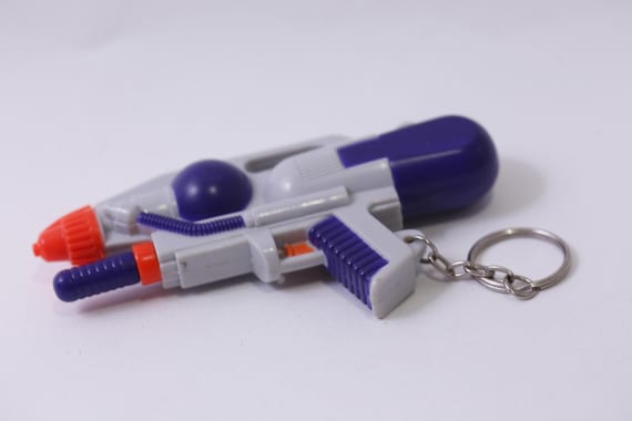 Basic Fun, Super Soaker, Keychain, Mini Squirt Gu… - image 1
