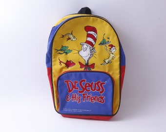 cat in the hat mini backpack EXCLUSIVE DROP: Loungefly Dr. Seuss Cosplay The Cat in the Hat is a book where an eccentric hat Loungefly Dr. Seuss The Cat
