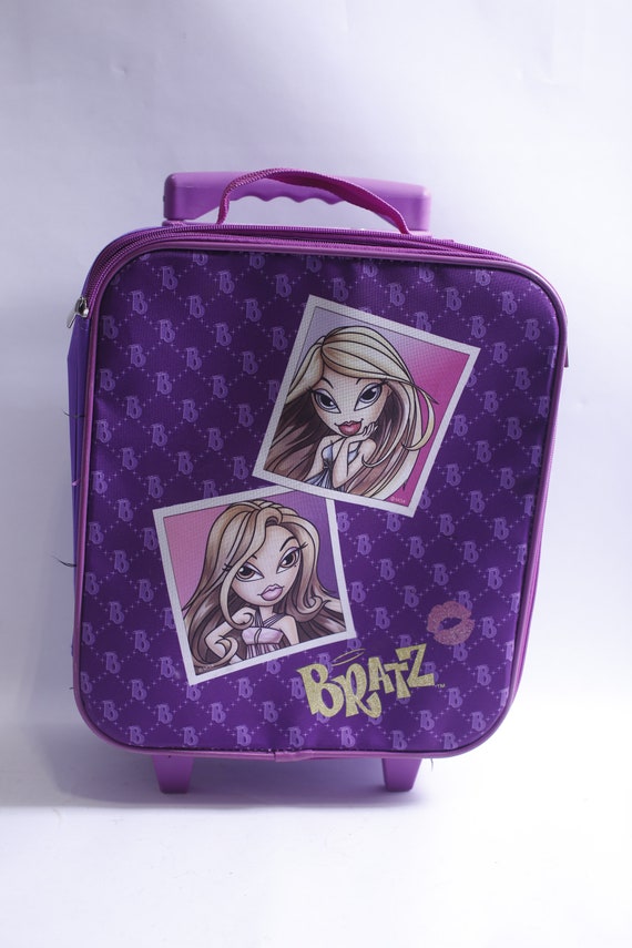 Purple rolling suitcase hotsell