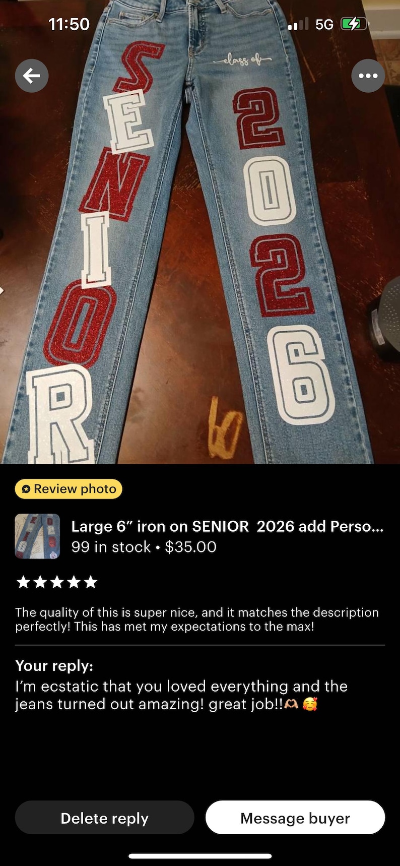the word "SENIOR" and the number "2026" in red glitter and white glitter letters and numbers. The words are vertically aligned on the front of the jeans. "Class of" is written in cursive.