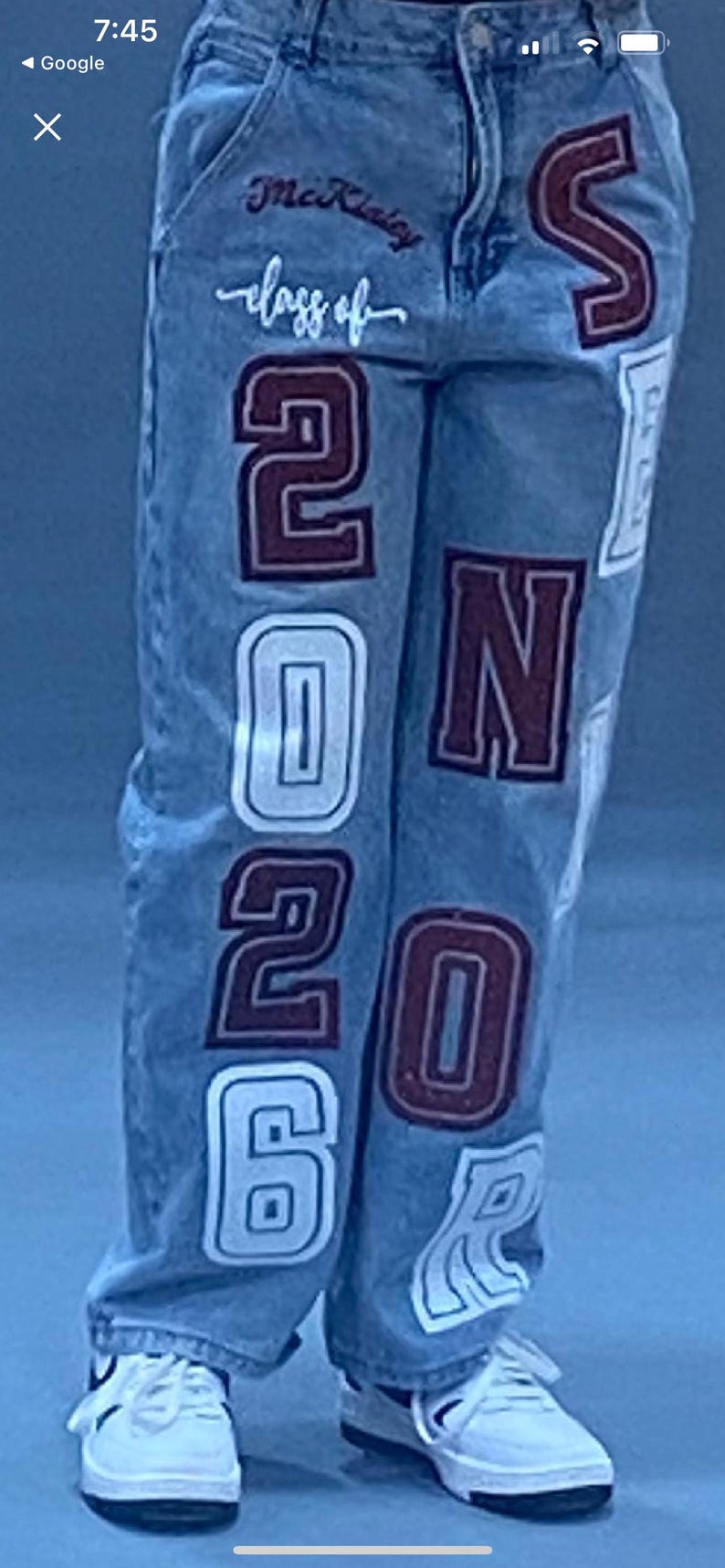 white and maroon lettering and patches. The text "McKinley class of" is  on the front pocket. The numbers "2026" are prominently displayed on the legs. SENIOR