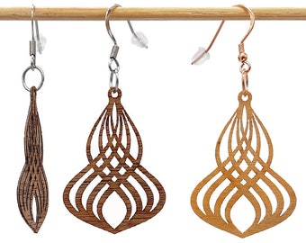Orecchini sospesi grafici curve geometriche, realizzati in legno tenero infrangibile tagliato al laser.  Gioielli moderni personalizzabili