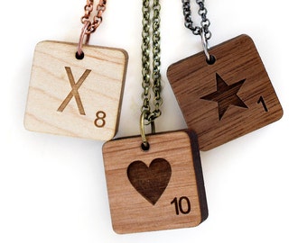 Small customizable scrabble pendant engraved and laser cut. Letter or symbol of your choice. Color, length as desired.