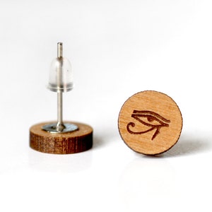 Customizable round stud earrings. Laser-cut engraved varnished wood, Egyptian eye Horus glyph jewel. Visual god pyramid egypt image 3