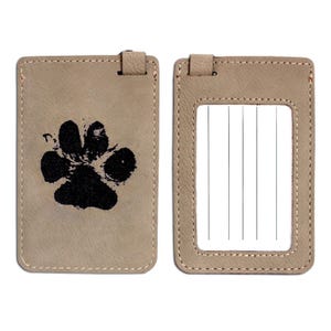 Bagagelabel met de voetafdruk van uw huisdier erop gegraveerd. Kofferaccessoire, hondentas, kattenbagage, transporttas, etc.