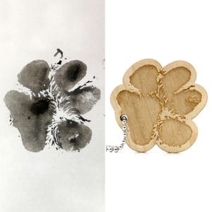 Customizable wooden keychain created from your pet&#39;s paw print. Engraved cat dog paw. Unique gift