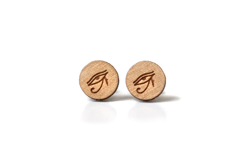 Customizable round stud earrings. Laser-cut engraved varnished wood, Egyptian eye Horus glyph jewel. Visual god pyramid egypt image 2