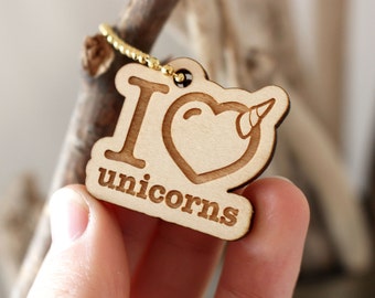 I love Unicorns, my mistress, BEER or i love my garden in laser engraved wood. Inscription, color of wood and attach to the choice.