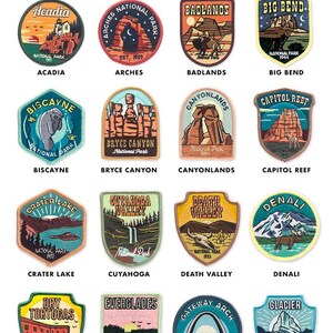 May include: A collection of embroidered patches featuring various U.S. National Parks. Each patch showcases a unique design and the park's name, including Acadia, Arches, Badlands, Big Bend, and others. The patches are colorful and detailed.