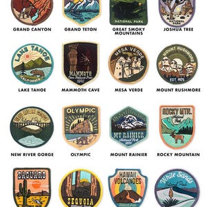 May include: A collection of embroidered patches featuring various U.S. National Parks. Each patch showcases a unique design with park names like Grand Canyon, Joshua Tree, and Rocky Mountain. The patches are circular or shield-shaped, with vibrant colors and detailed illustrations.