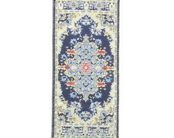 May include: A silver hanging ornament with a blue and gold patterned fabric panel and a blue evil eye charm. The ornament has a decorative metal frame and three dangling charms.