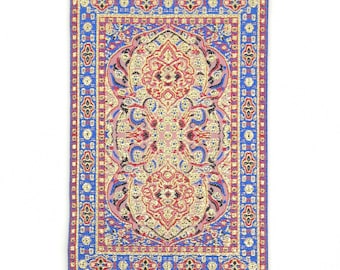 May include: A silver and blue wall hanging with a traditional Turkish rug design and a blue evil eye charm hanging from the bottom.