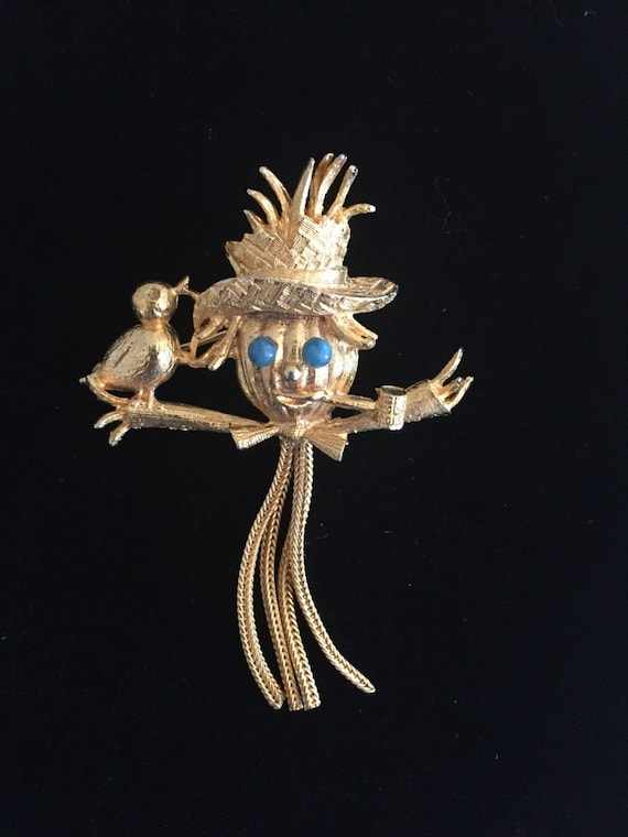 Lisner Gold Toned Scarecrow with Tassels Brooch