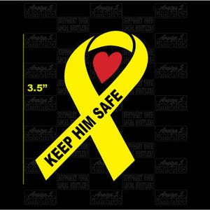 May include: A yellow ribbon with a red heart in the center and the text "Keep Him Safe" printed on it. The ribbon is 3.5 inches wide.