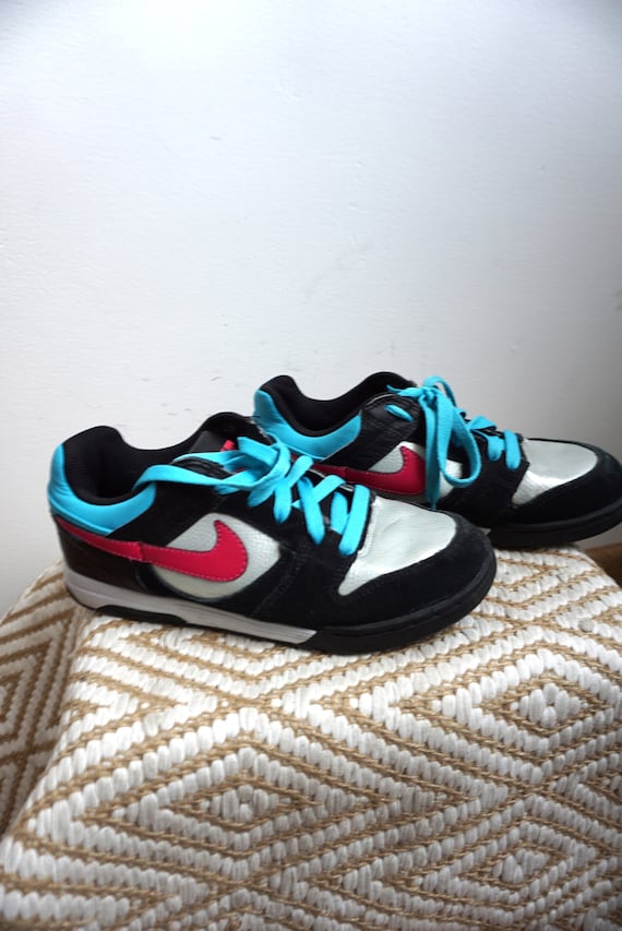 Pink leather nike shoes sales